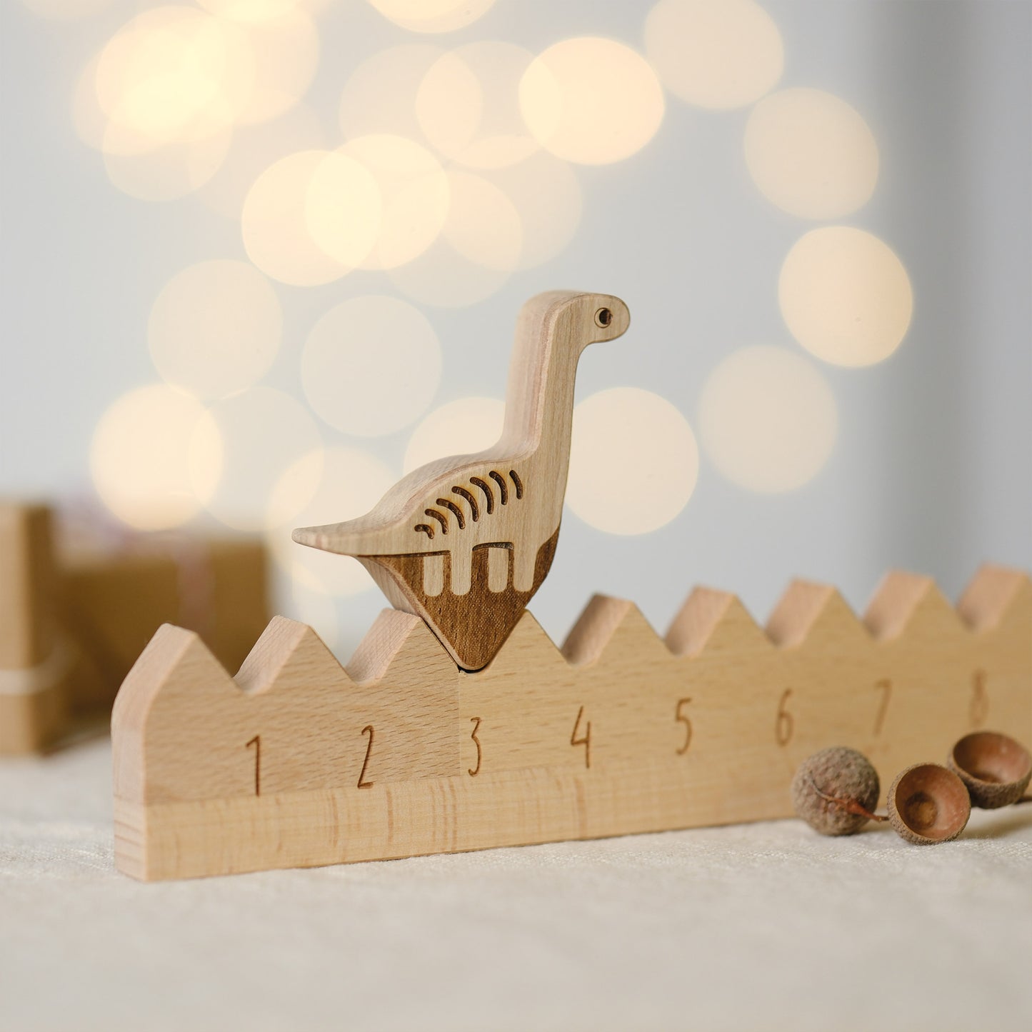 Adventskalender aus Holz - Dinosaurier